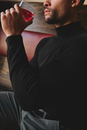 Extra Fine Merino Wool Roll Neck Jumper in Black