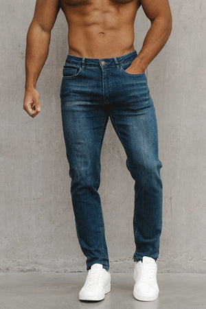 Muscle Fit Jeans in Mid Blue
