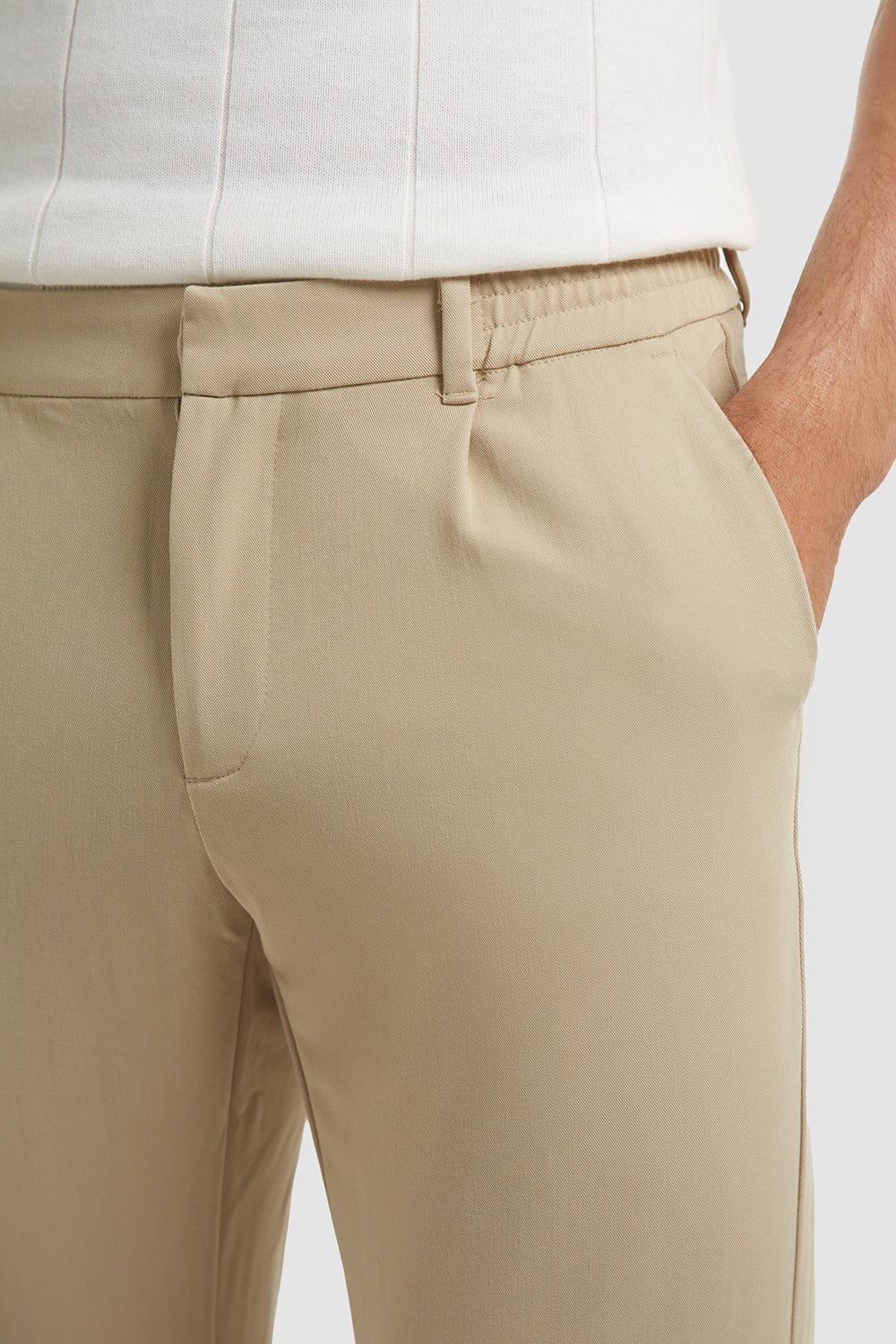 Cropped Pleated Trouser in Stone - TAILORED ATHLETE - ROW