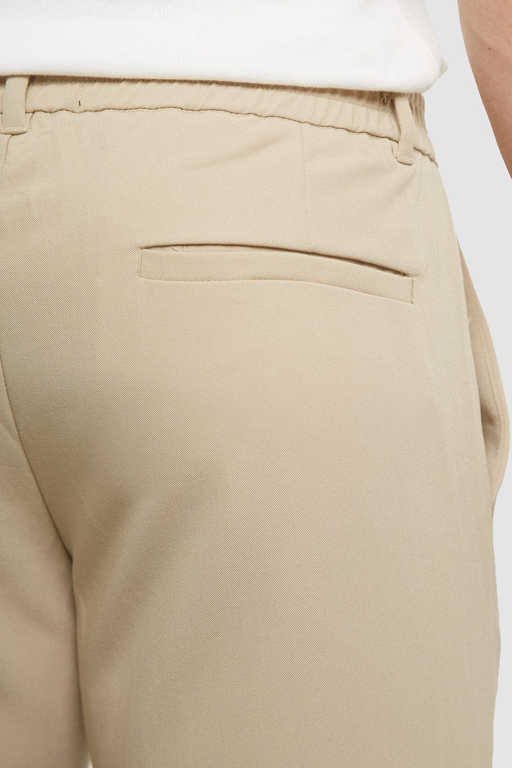 Cropped Pleated Trouser in Stone - TAILORED ATHLETE - ROW