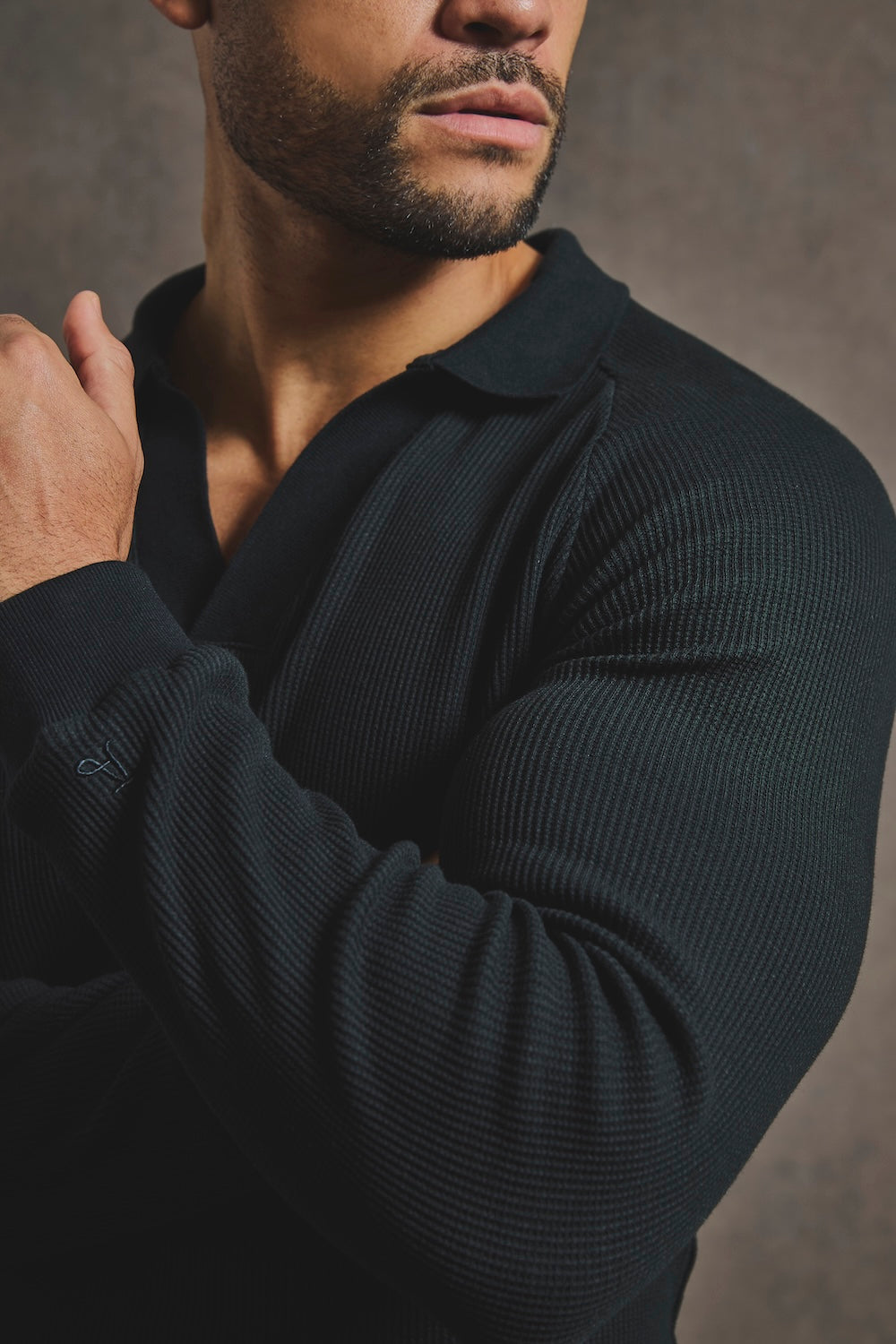 Textured Buttonless Polo Shirt in Black