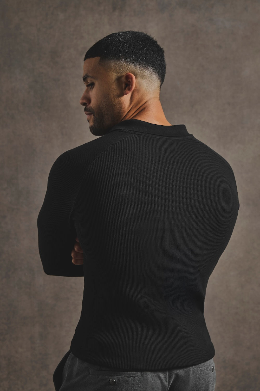 Textured Buttonless Polo Shirt in Black