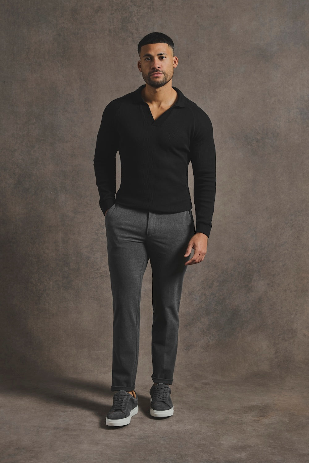 Textured Buttonless Polo Shirt in Black
