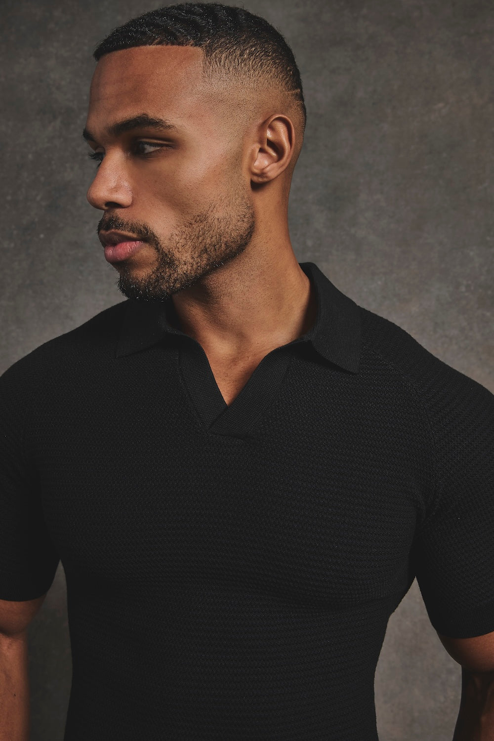 Textured Knitted Open Collar Polo Shirt in Black