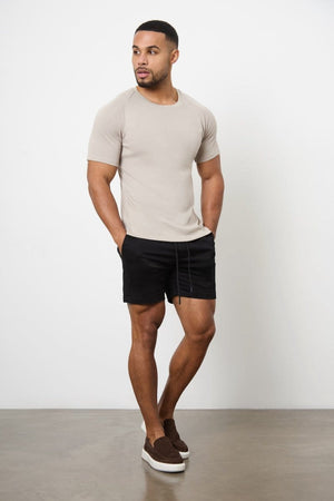 Model is 5'11 and wears a size 34W for a looser fit (31" waist, 31" inside leg)