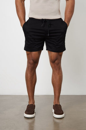 Model is 5'11 and wears a size 34W for a looser fit (31" waist, 31" inside leg)