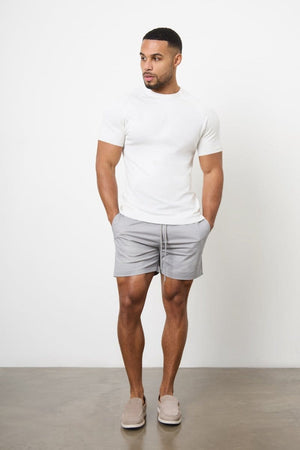 Model is 5'11 and wears a size 34W for a looser fit (31" waist, 31" inside leg)