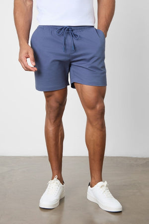 Model is 5'11 and wears a size 34W for a looser fit (30.5" waist, 31" inside leg)