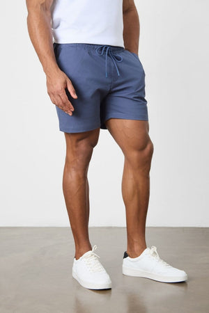 Model is 5'11 and wears a size 34W for a looser fit (30.5" waist, 31" inside leg)