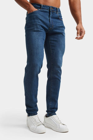 Muscle Fit Jeans in Dark Blue - TAILORED ATHLETE - ROW