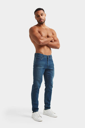 Muscle Fit Jeans in Mid Blue - TAILORED ATHLETE - ROW