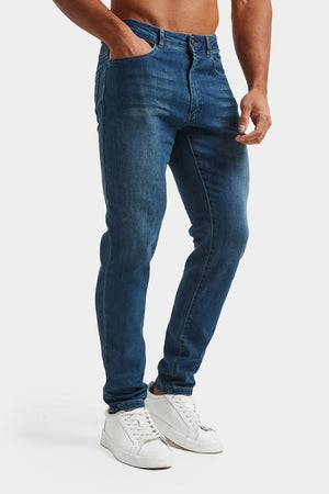 Muscle Fit Jeans in Mid Blue - TAILORED ATHLETE - ROW