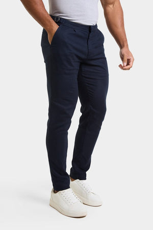Linen Blend Cropped Pleated Trousers in Navy - TAILORED ATHLETE - ROW