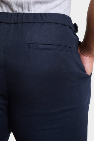 Linen Blend Cropped Pleated Trousers in Navy - TAILORED ATHLETE - ROW