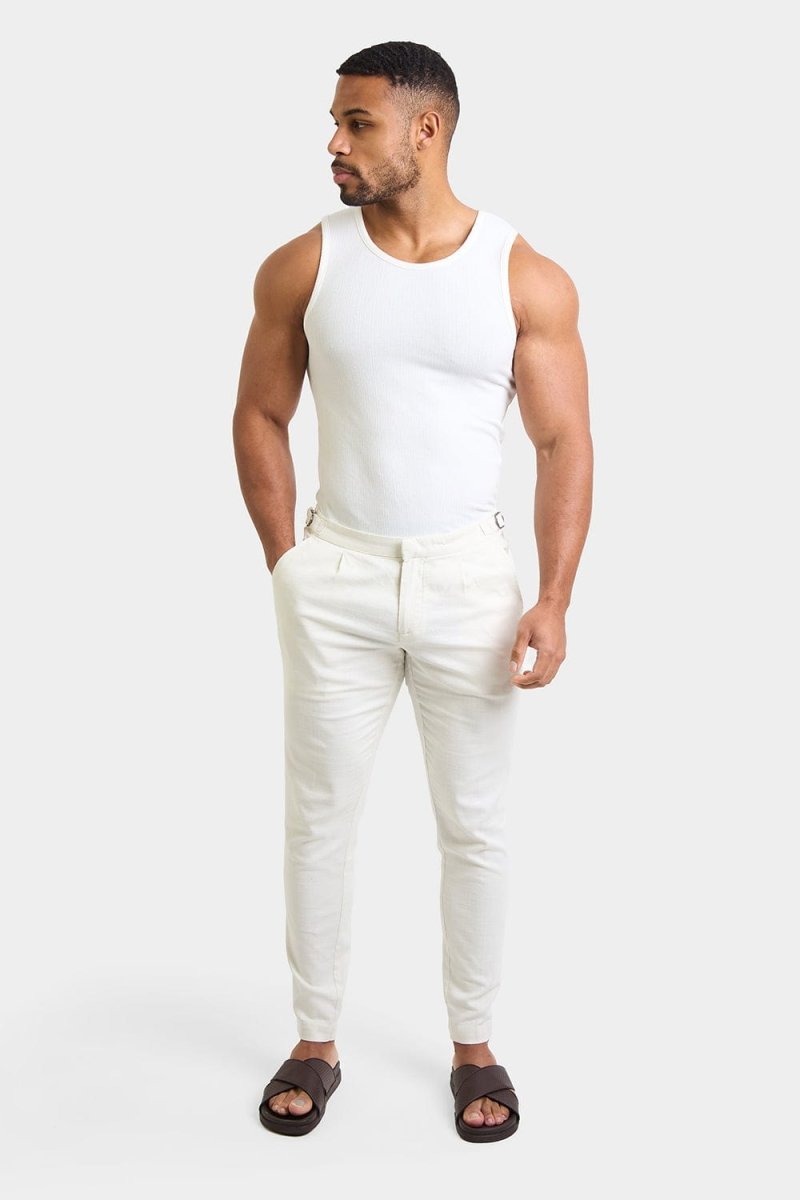 Linen Blend Cropped Pleated Trousers in Chalk - TAILORED ATHLETE - ROW