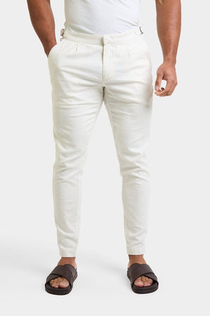 Linen Blend Cropped Pleated Trousers in Chalk - TAILORED ATHLETE - ROW