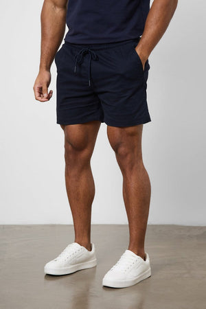 Model is 5'11 and wears a size 34W for a looser fit (31" waist, 31" inside leg)